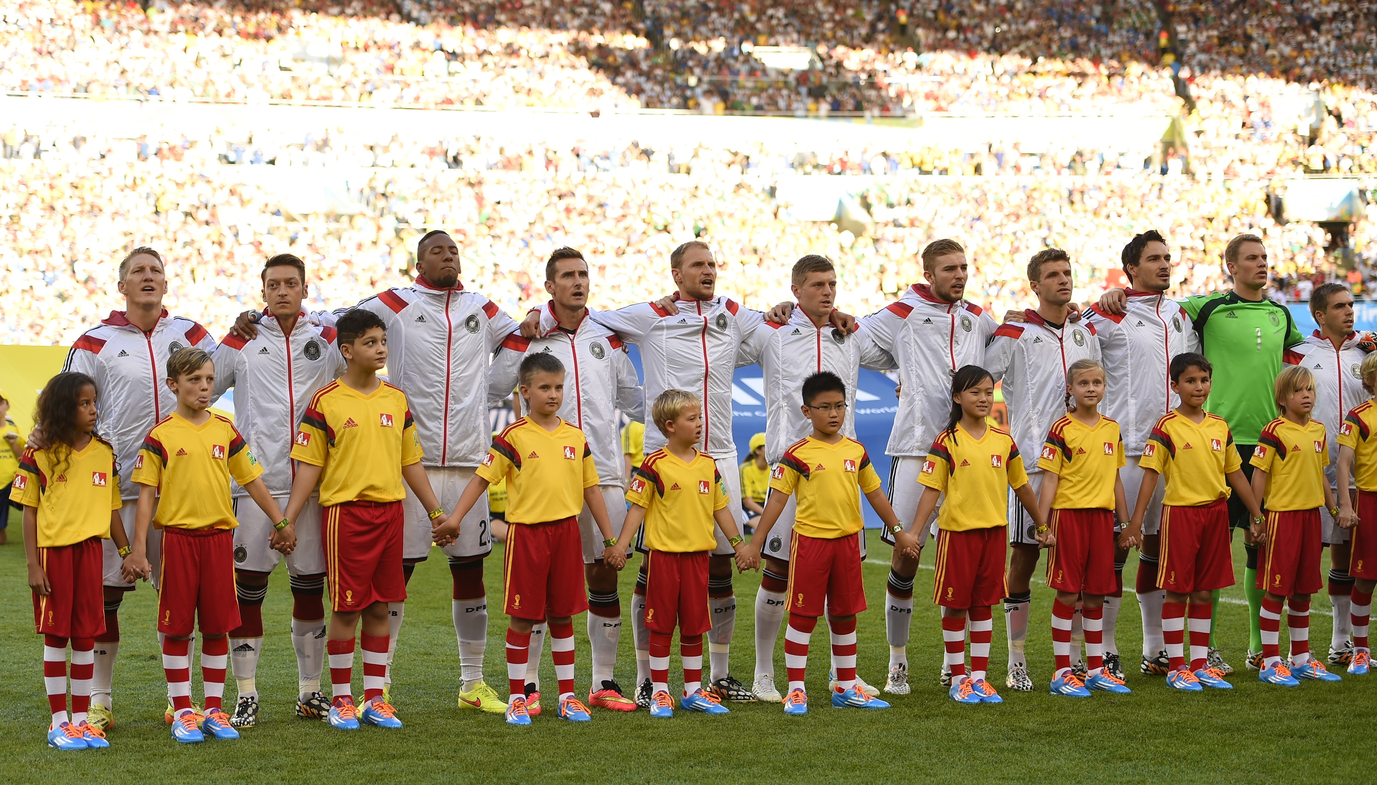 Germany players sing the national anthem ahead of their World Cup final match against Argentina in Brazil in July 2014.