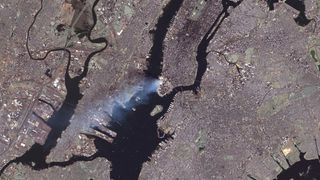 After the Sept. 11 terror attack on New York City 18 years ago today, the United States Geological Survey's (USGS) Landsat 7 satellite captured this view of the aftermath from space. In this image, captured by the satellite's Enhanced Thematic Mapper Plus (ETM+) instrument on Sept. 12, 2001, a plume of smoke is seen rising from lower Manhattan, where the World Trade Center was destroyed.