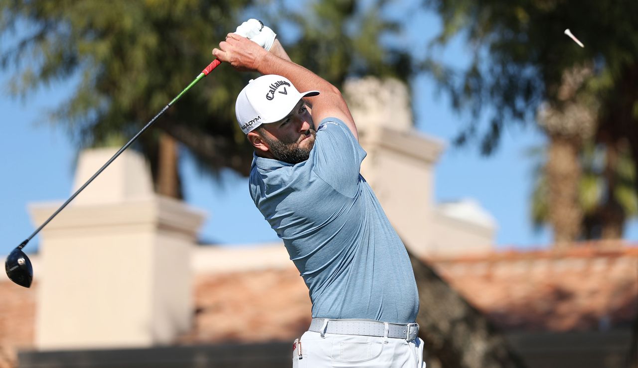 Rahm hits his tee shot