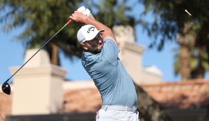 Rahm hits his tee shot