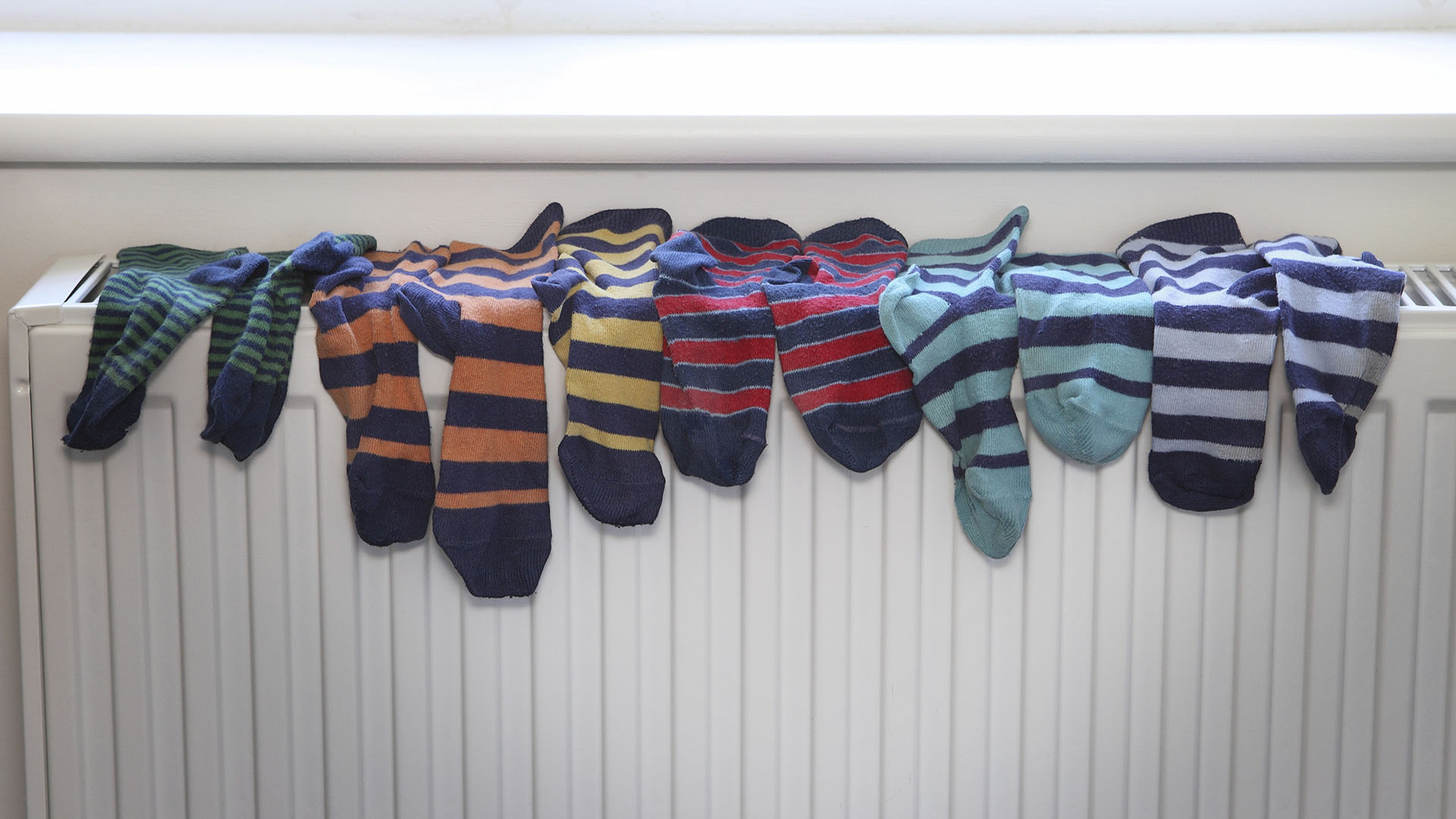 Socks drying on a radiator