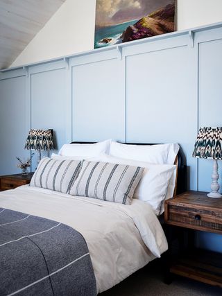 bedroom with blue panelling