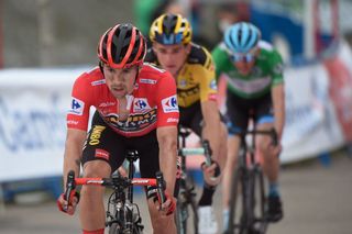 Team Jumbos Slovenian rider Primoz Roglic L crosses the finishline during the 12th stage of the 2020 La Vuelta cycling tour of Spain a 1094km race from Pola de Laviana to Alto de lAngliru on November 1 2020 Photo by MIGUEL RIOPA AFP Photo by MIGUEL RIOPAAFP via Getty Images