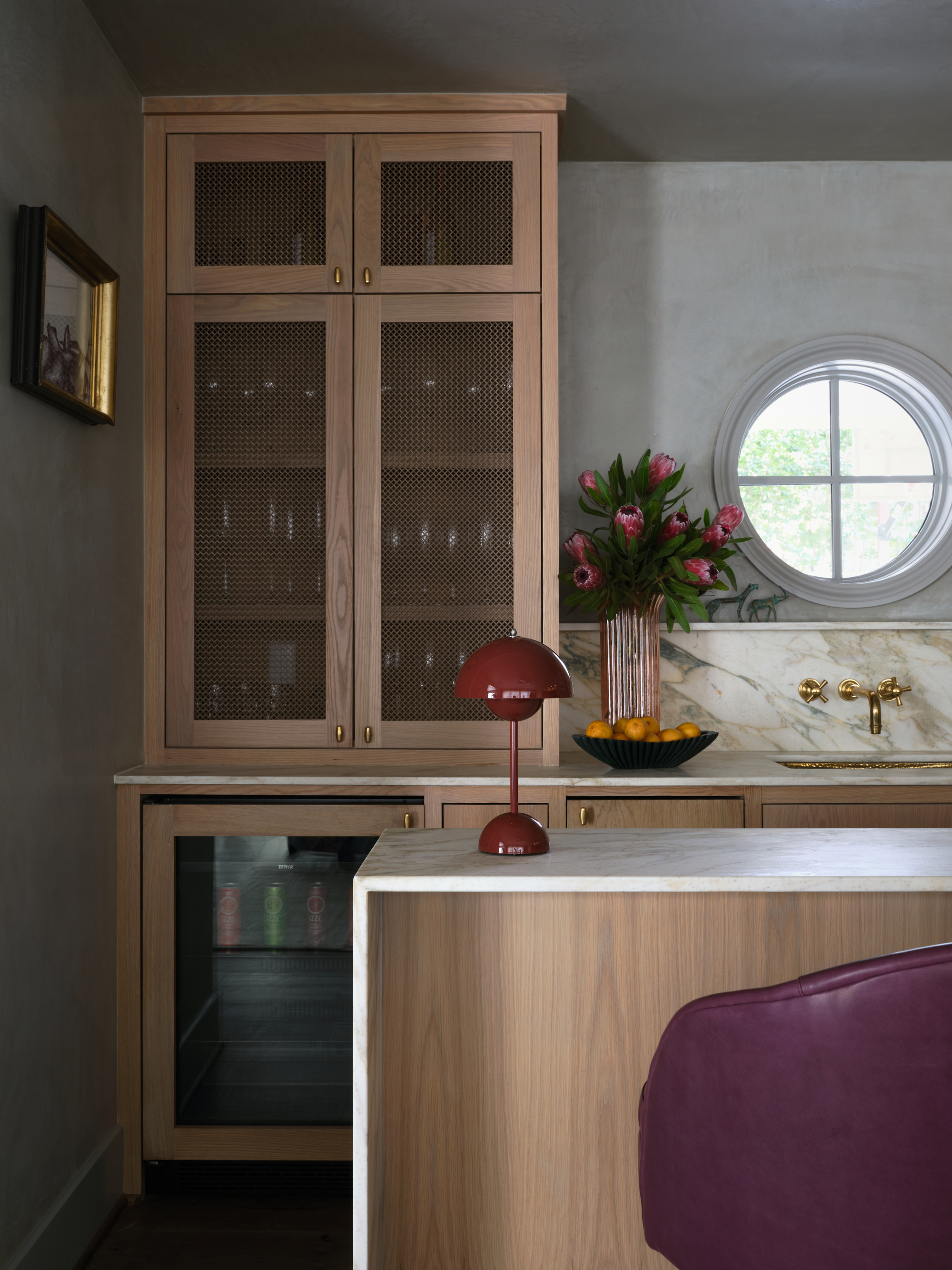 bar room with a cabinet of glassware 