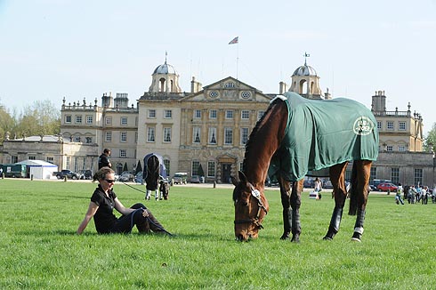 Groom Laurie Robinson relaxing in front of Badminton house with Twinkle Bee