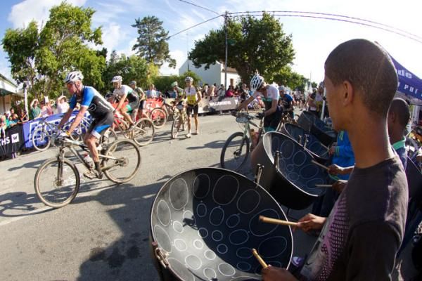 A local band encourage cyclists through McGregor
