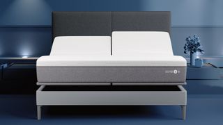 A split king Sleep Number i8 smart bed mattress on an adjustable FlexFit Base, with the head raised on both sides of the mattress