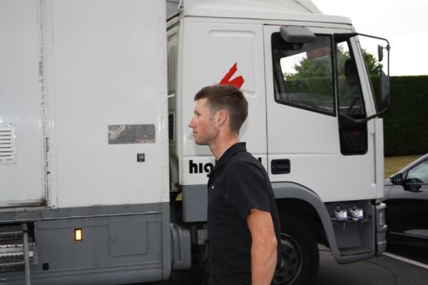 Renshaw arrives at the team hotel having showered and changed on the bus