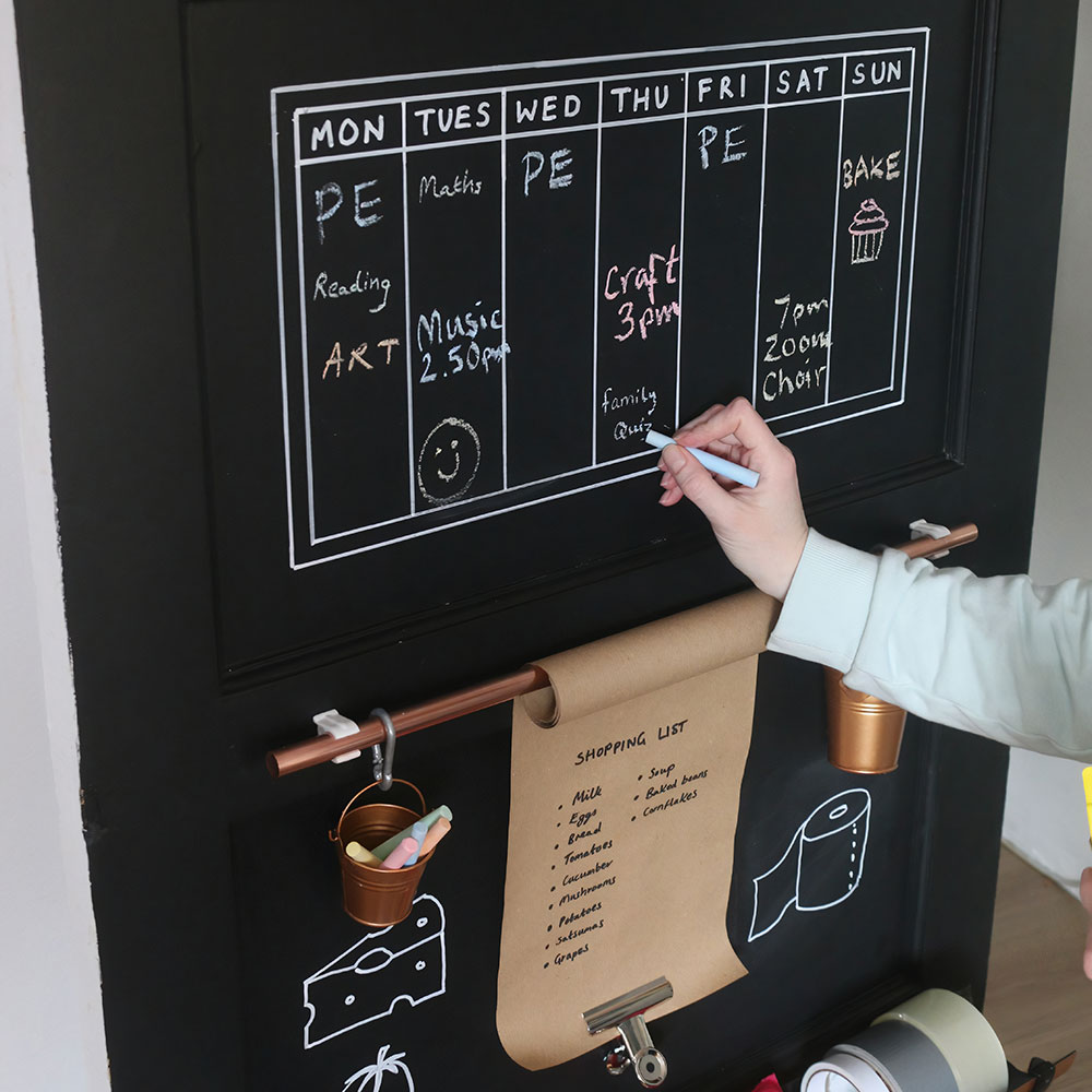 black door with shopping list