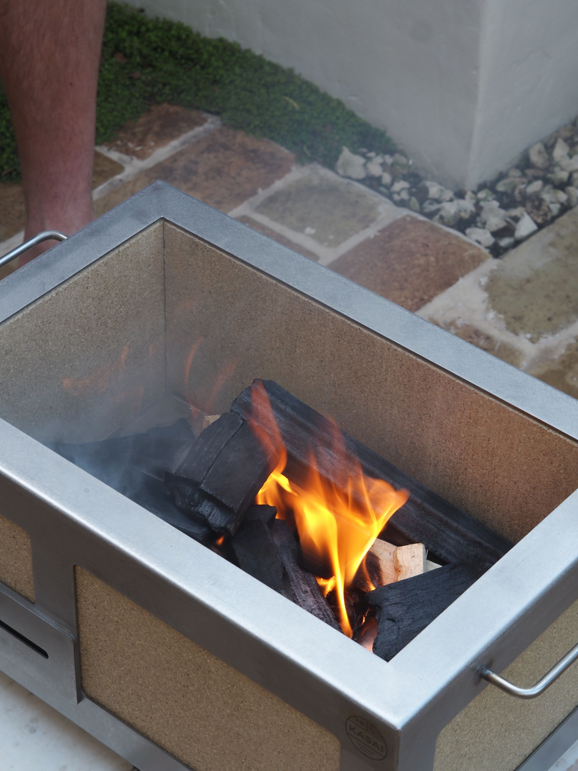 a kasai bbq grill in a garden 