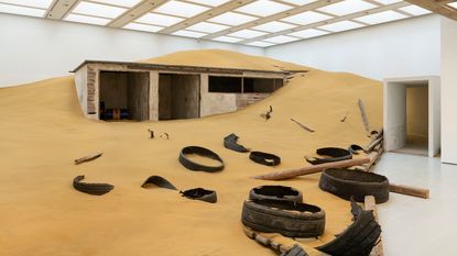 Installation view of Mike Nelson, Triple Bluff Canyon (the-woodshed), 2004 at Hayward Gallery, London 