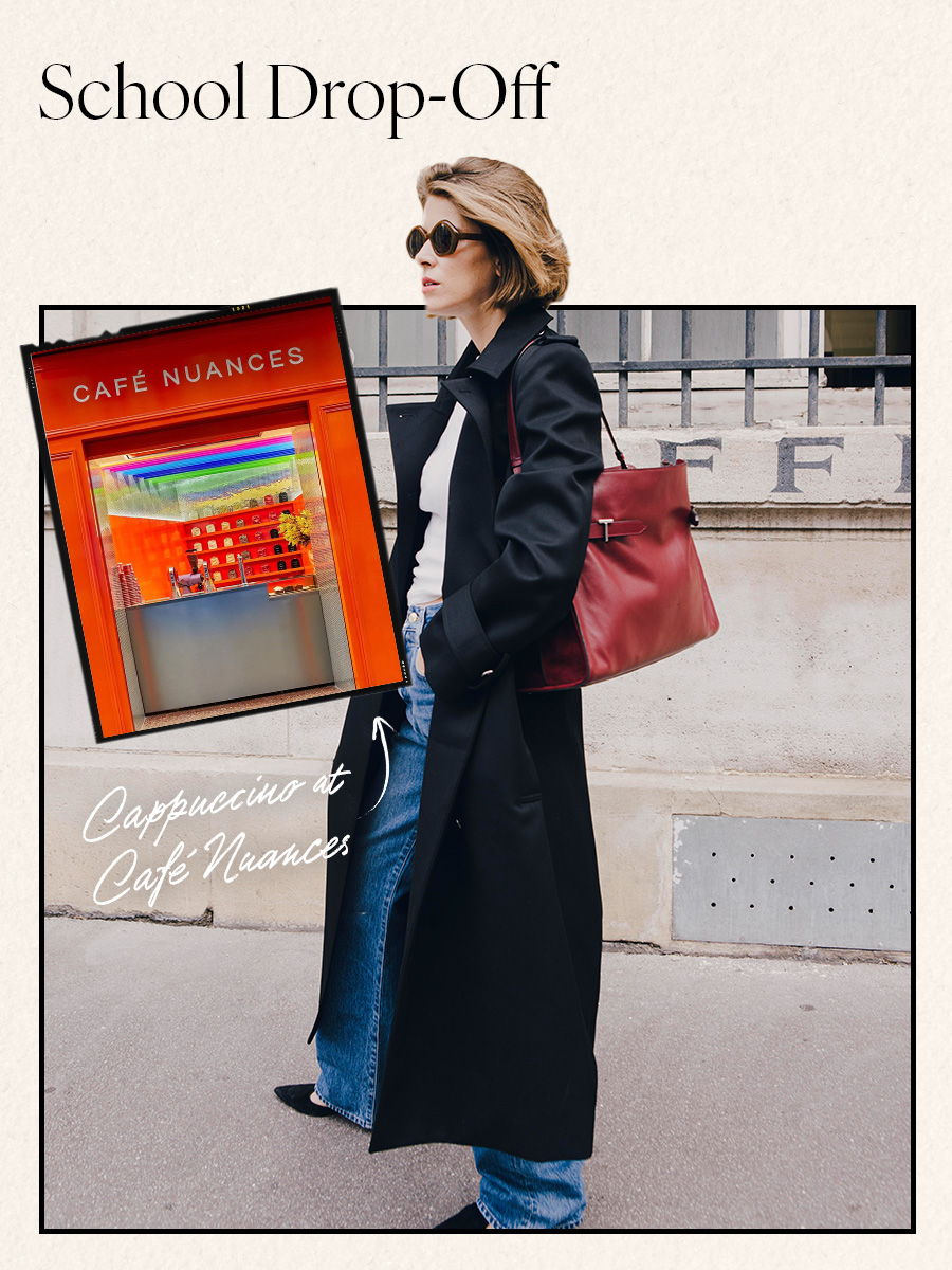 Woman in black trench and jeans