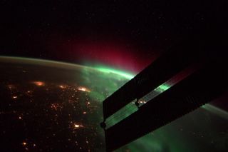NASA astronaut Reid Wiseman captured this spectacular view of auroras over Earth as he gazed out a window on the International Space Station on Sept. 24, 2014.