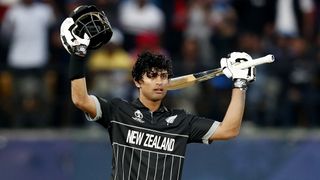  Rachin Ravindra of New Zealand raises his bat above his head prior to the New Zealand vs South Africa Cricket World Cup match. 