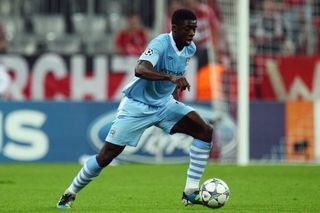 Kolo Touré on the ball for Manchester City against Bayern Munich in the Champions League in September 2011.