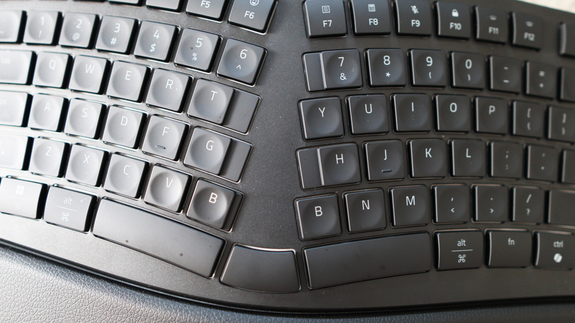 Razer Pro Type Ergo ergonomic keyboard on marble surface
