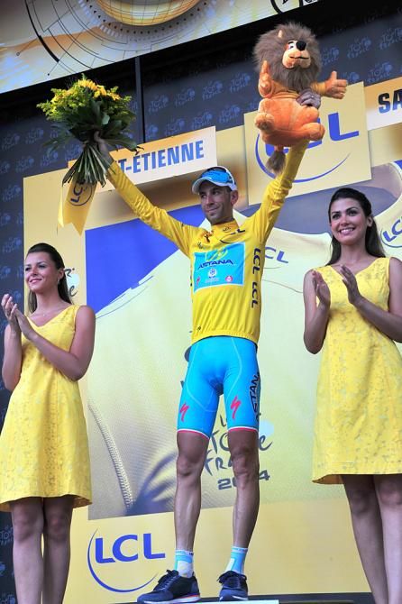 Vincenzo Nibali gets more practice on the yellow jersey podium