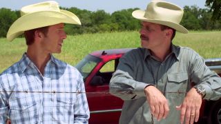 Glen Powell and Bill Paxton in cowboy hats in Red Wing