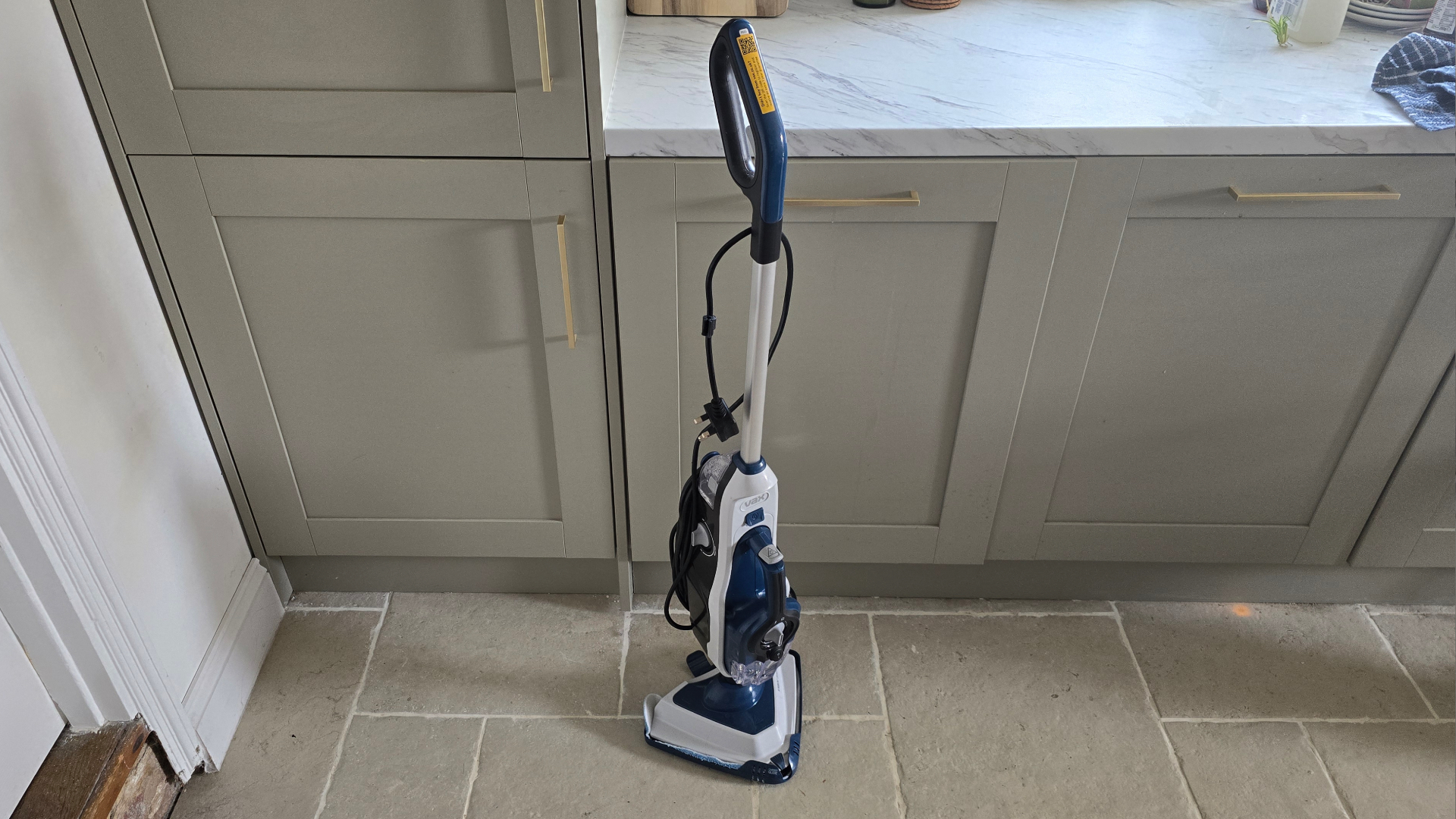 Vax Steam cleaner in sage green kitchen