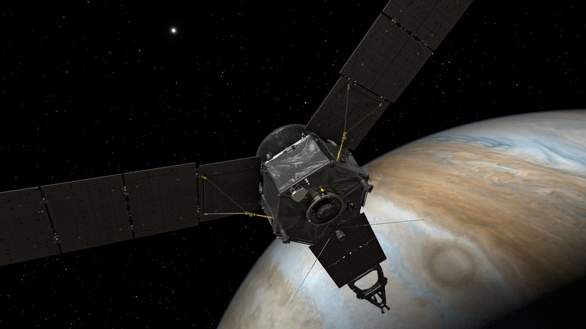 This artist&#039;s rendering shows NASA&#039;s Juno probe at Jupiter, with its solar arrays and main antenna pointed toward the sun and Earth.