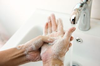 Person washing hands