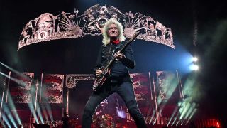Brian May onstage at the O2 in London, June 2022