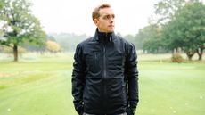 Jonny Leighfield modelling the HLINC Full Zip Waterproof Links Golf Jacket