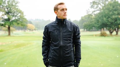 Jonny Leighfield modelling the HLINC Full Zip Waterproof Links Golf Jacket