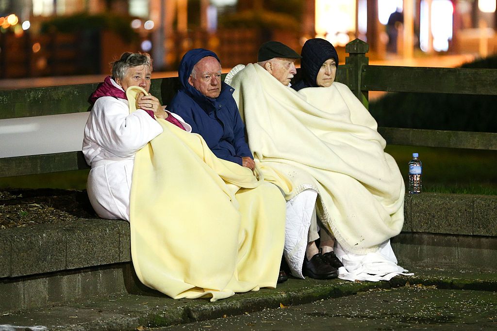 Hotel guests in New Zealand huddle outside after a 7.8 magnitude earthquake