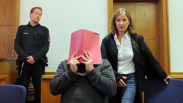 OLDENBURG, GERMANY - NOVEMBER 27: Niels H. arrives for his trial at court on November 27, 2014 in Oldenburg, Germany. Originally charged with the murder of several patients at a clinic in Del