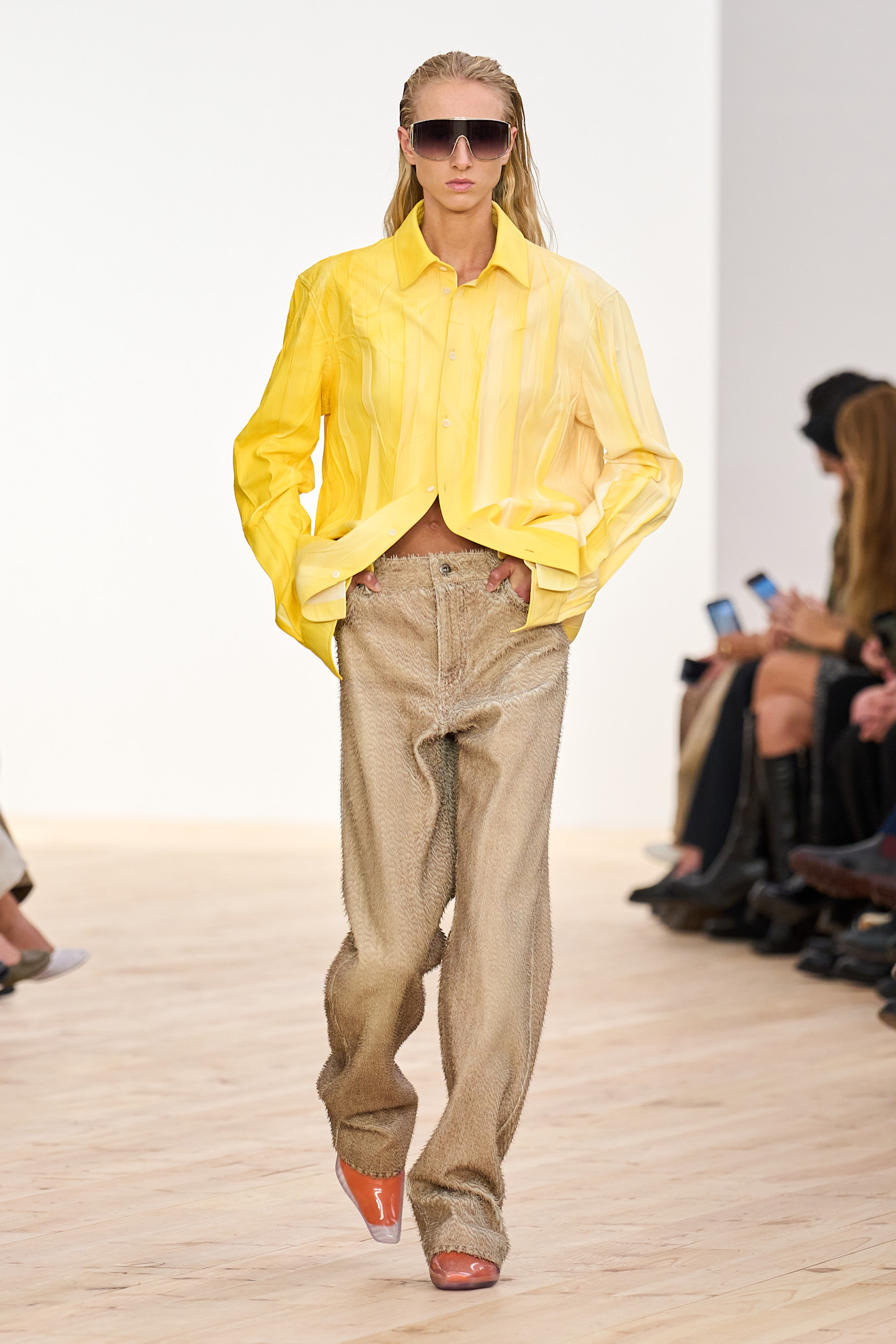 Photos of runway models wearing bug-eye sunglasses during the Spring Summer 2026 season.