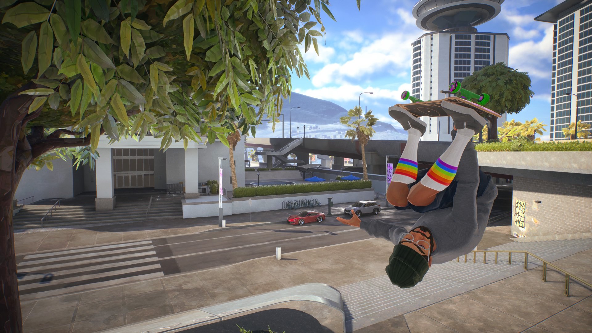 Skate screenshot of a skater performing a trick in the air and he&#039;s currently upside down in the shot as he does so