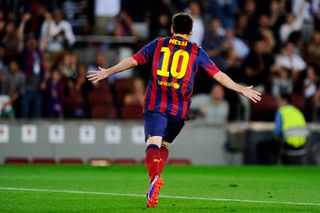 Lionel Messi celebrates after scoring his first goal for Barcelona against Ajax in the Champions League in September 2013.