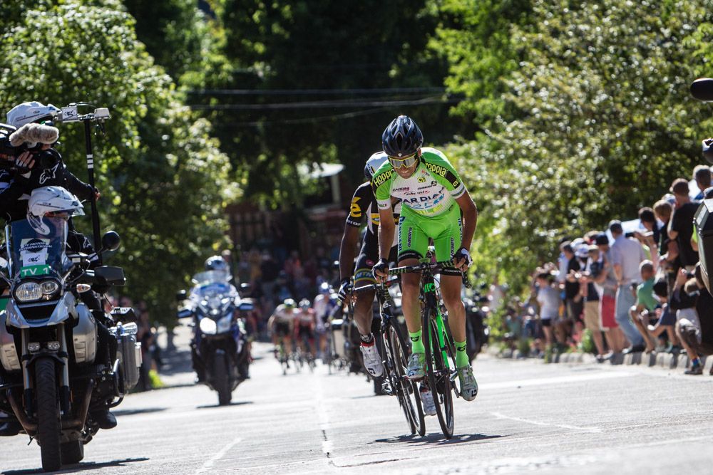 Riders launch an attack with 2 laps to go
