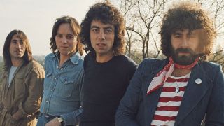 10cc pose in a field before Top Of The Pops in 1975