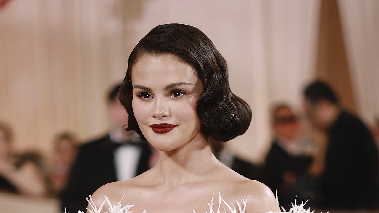 Selena Gomez smiling at the 2026 Golden Globes