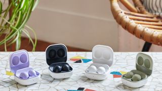 Four Samsung Galaxy Buds cases on a table