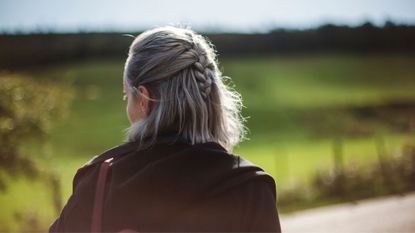 Woman walking in the countryside