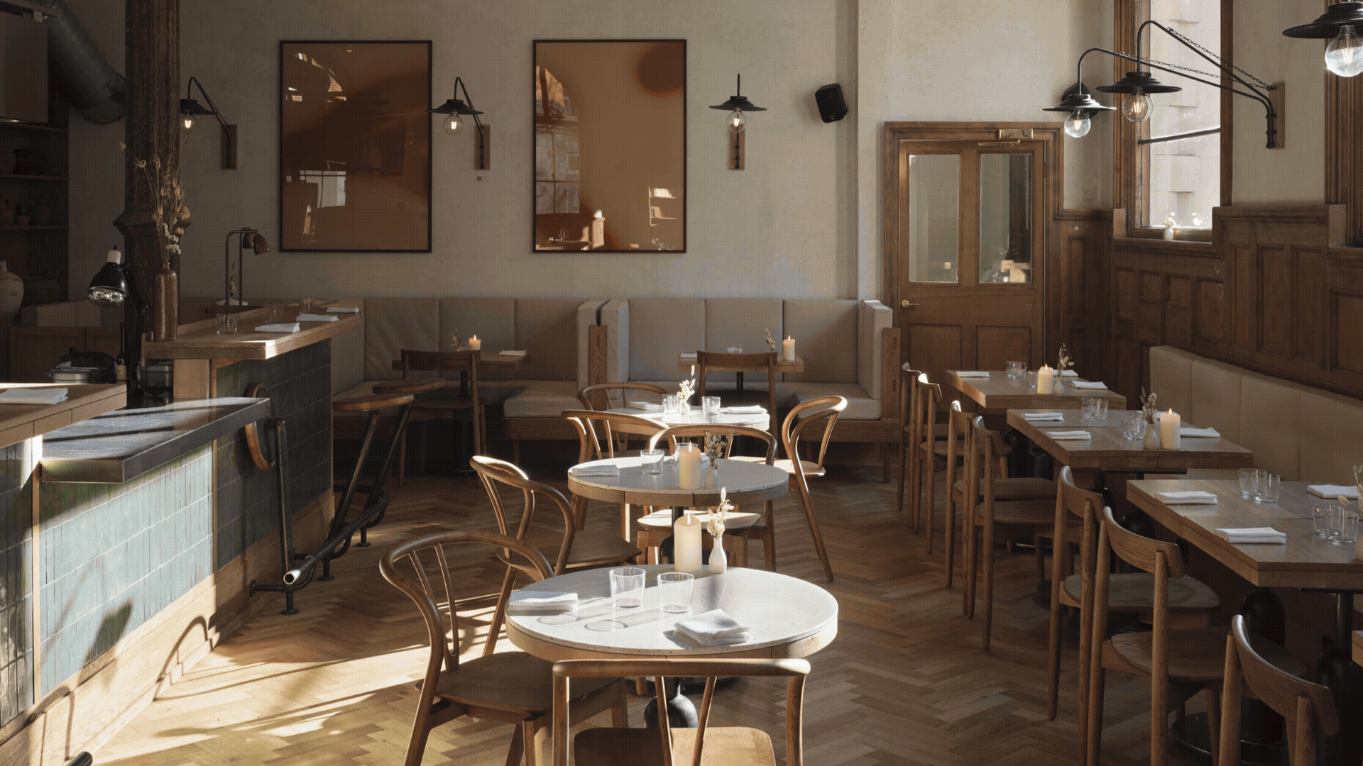 A GIF of a London restaurant with a focus on cutlery drawers in dining tables
