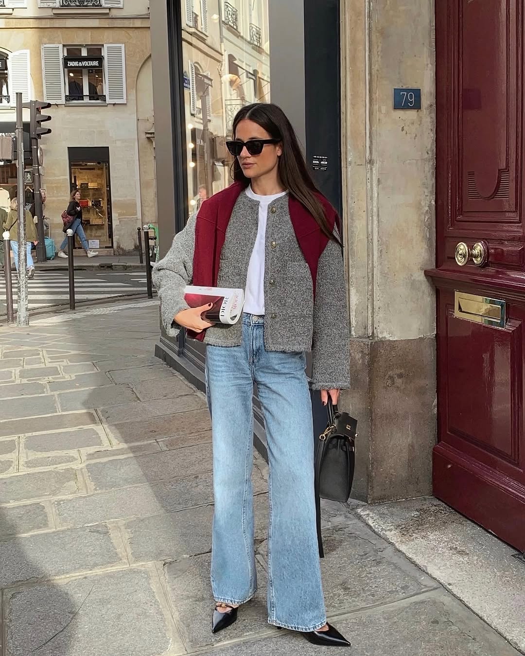 woman wearing black pointed toe heels jeans fall outfits 2025