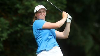 Lottie Woad takes a tee shot during a practice round before the Curtis Cup