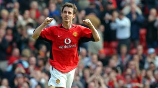 MANCHESTER, ENGLAND - APRIL 5: Gary Neville celebrates after the final whistle in the FA Barclaycard Premiership match between Manchester United v Liverpool at Old Trafford on April 5, 2003 in Manchester, England. (Photo by John Peters/Manchester United via Getty Images)