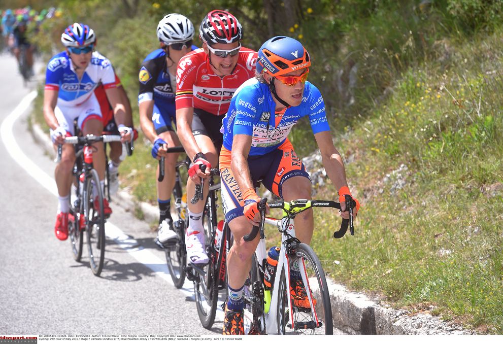 Cunego and Wellens go for the top of the first climb of the day