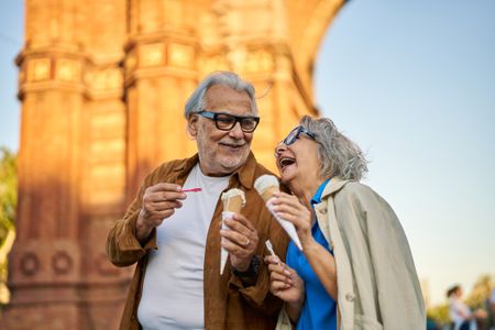Older couple having ice cream 