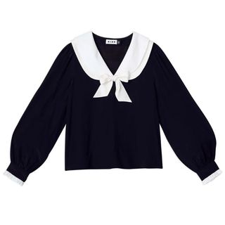 collared navy top with white bow