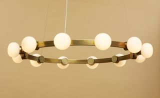 Rich Brilliant Willing revealed new designs, including their 'Cinema' chandelier (pictured)...