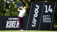 Elvis Smylie hits a driver off the tee