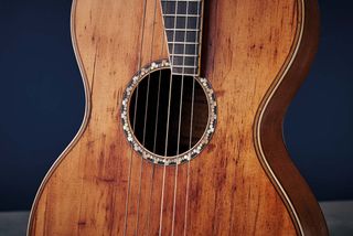 Minimal bracing includes one brace just below and a ‘popsicle’ brace above the soundhole – something Martin returned to in the 1930s after steel strings became standard.