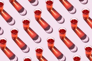 Drink spiking: Top view of glasses on the pink background
