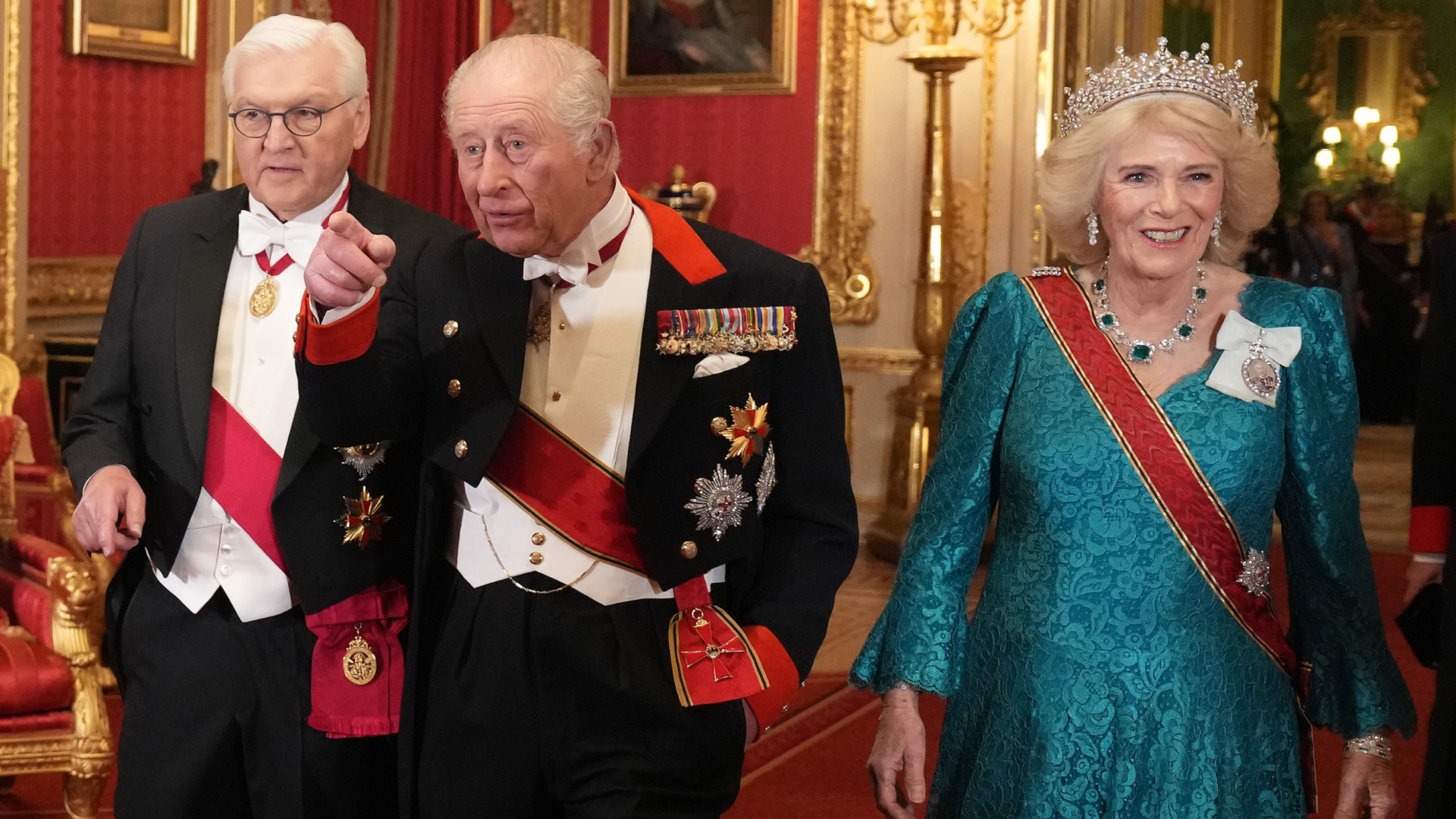 Queen Camilla wearing the Girls of Great Britain and Ireland tiara and a teal gown